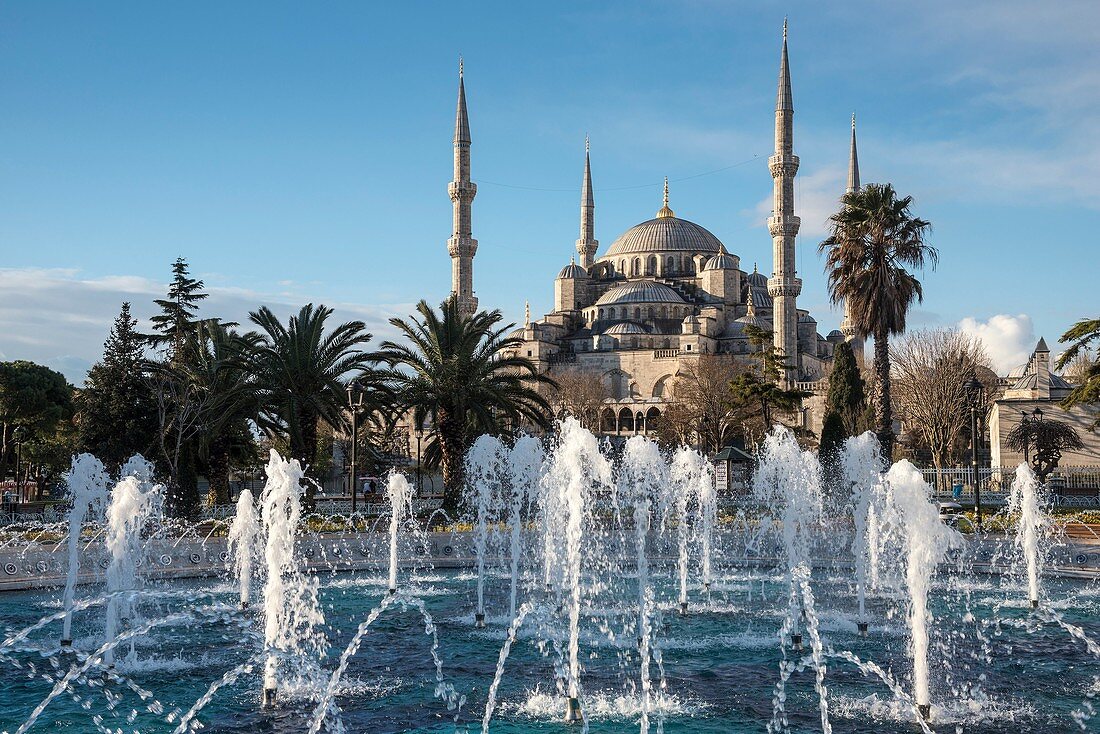 Early morning in the Sultanahmet Square with the Sultan Ahmet or Blue Mosque in the background, Sultanahmet, Istanbul, Turkey.