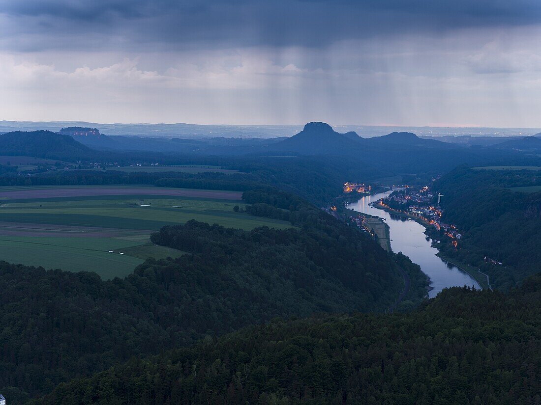 Elbe Sandstone Mountains (Elbsandsteingebirge) in the NP Saxon Switzerland (Saechsische Schweiz) during spring. Kipphorn viewpoint and the valley of river Elbe and spa Bad Schandau. Europe, Central Europe, Germany, Saxony, May.