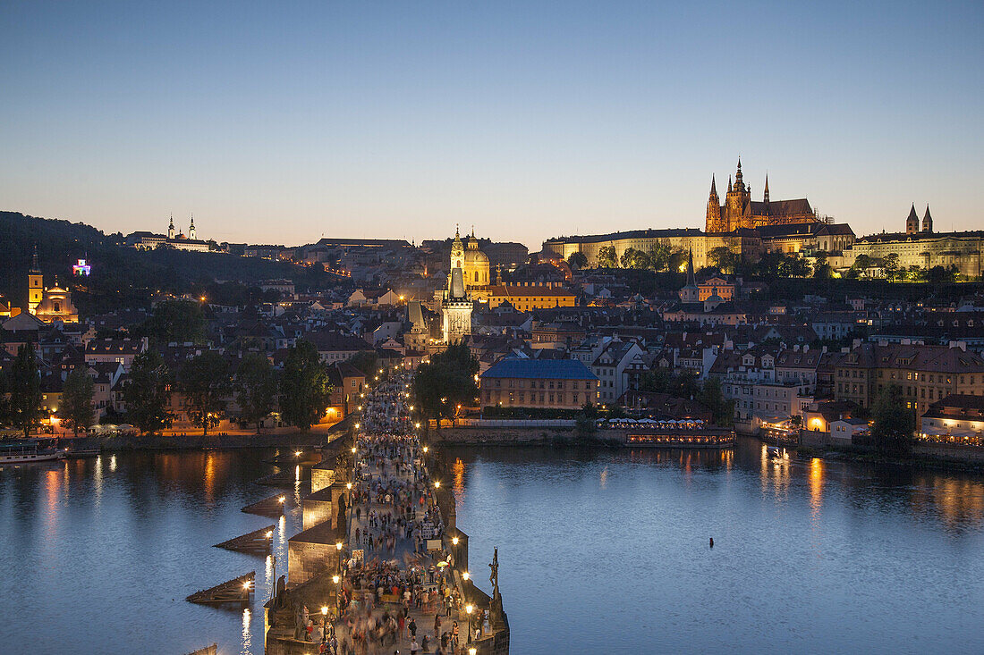 Charles Bridge and Castle illuminated at night, Prague, Czech Republic.