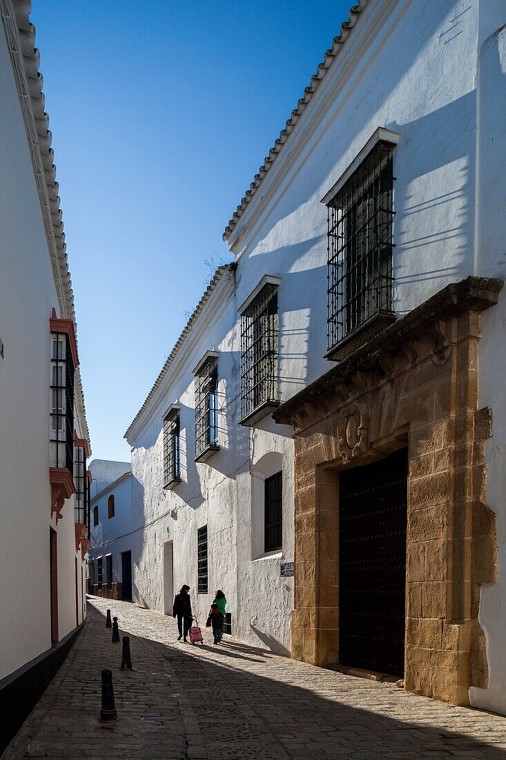 Casa Antigua del Ave Maria, typical Mediterranean architecture with whitewashed walls and narrow streets in the historical city of Carmona, province of Seville, Spain.