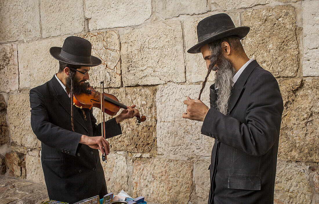 Orthodox Jews preaching as street musicians, in Jaffa gate , Old City, Jerusalem, Israel.