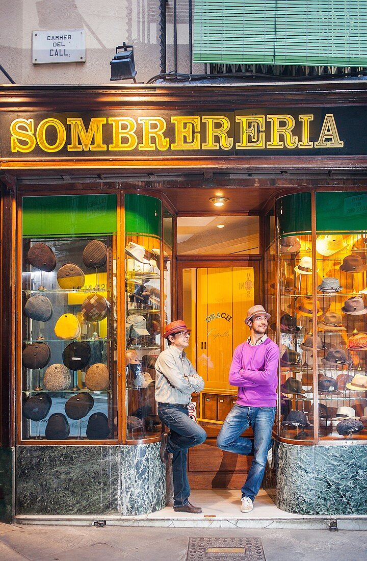 Sombrerería Obach, at right Pol Obach and Ramon Obach at left, they are the owners ( uncle and nephew), carrer del Call 2, Barcelona, Spain.