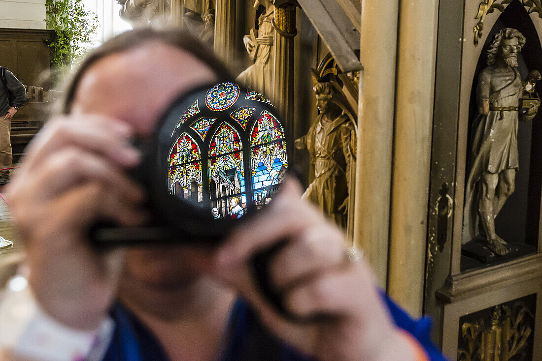 Stained glass windows reflected in the cameras lens in Saint Mary’s Cathedral, Riga, Latvia.