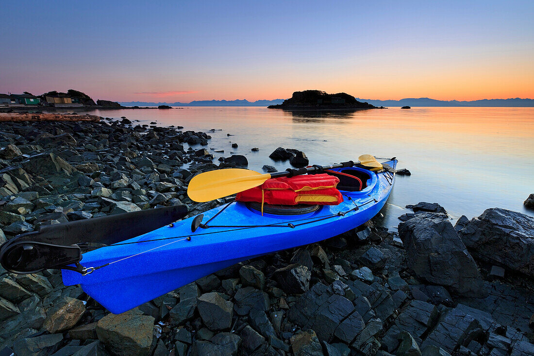 Sea kayak at sunrise, Pipers Lagoon Park, Nanaimo, Vancouver Island, British Columbia.