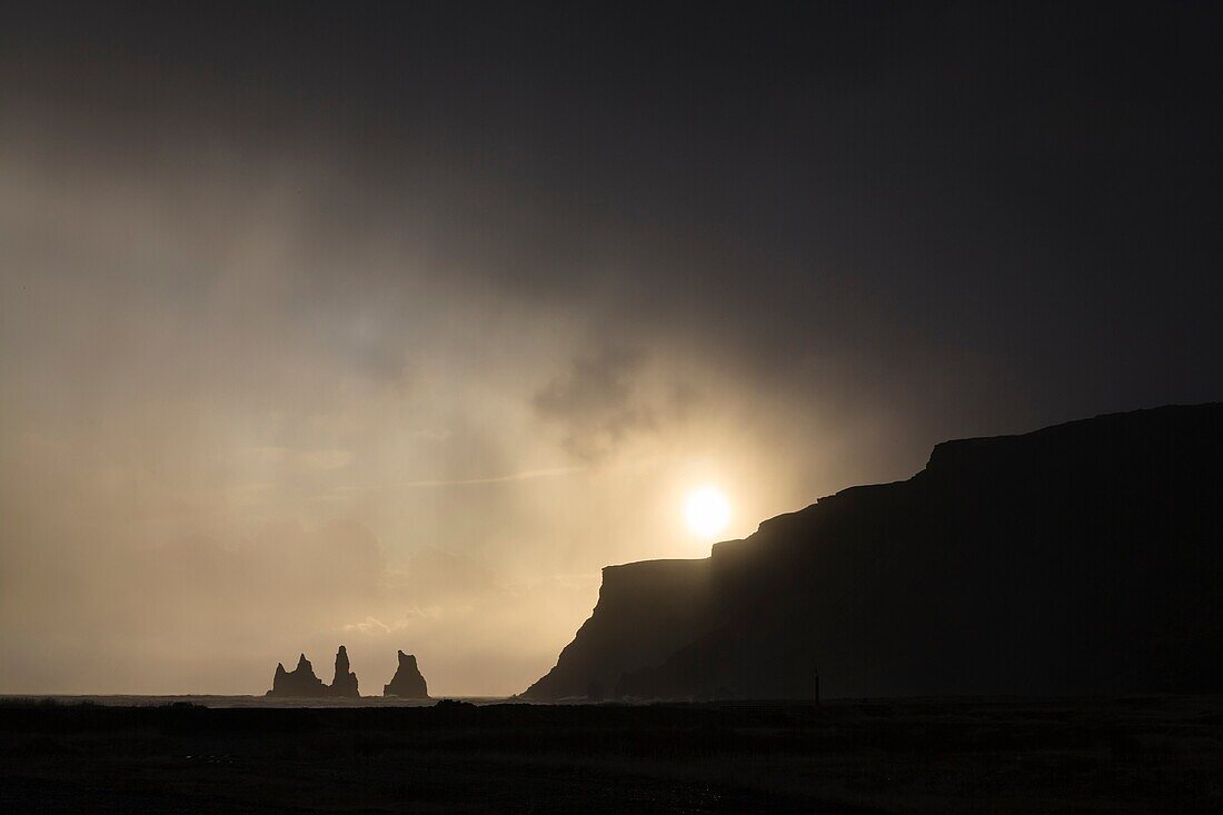 Sea stacks at Reynisdrangar at dusk. Vik. Iceland.