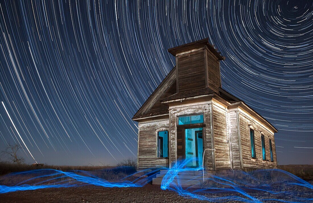 Abandoned Taiban Presbyterian Church in New Mexico at night with star trails.