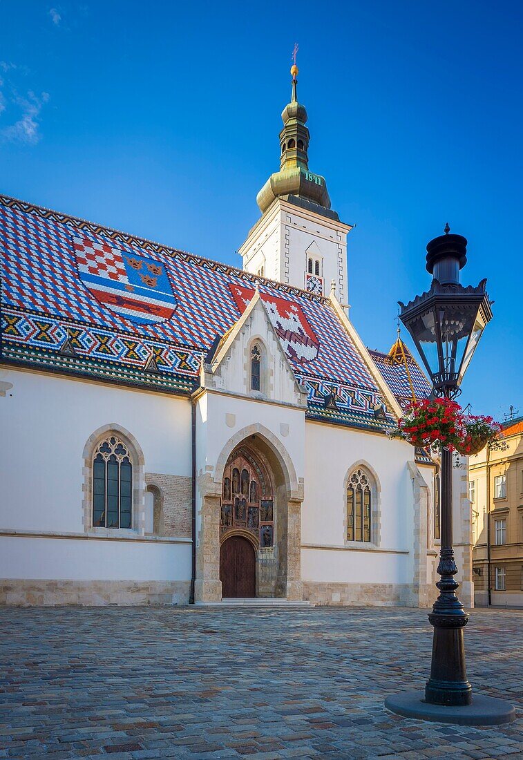 'The colourful Church of St. Mark is one of the oldest buildings in Zagreb and of its symbols. It is first mentioned in the list of parish churches in the Kaptol Statute of 1334.It was built in the 13th century; from that first, Romanesque period, only a 