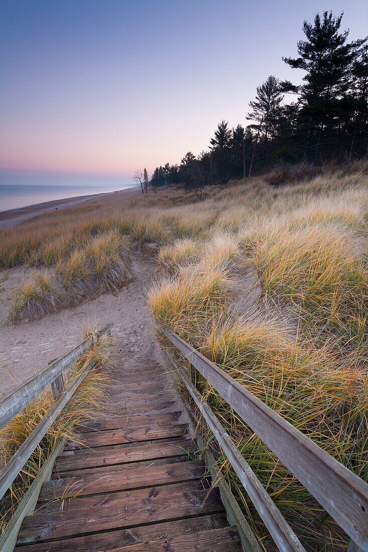 Stairs and a trail leading to a sandy beach along the shores of Lake Huron. Pinery Provincial Park, Ontario, Canada.