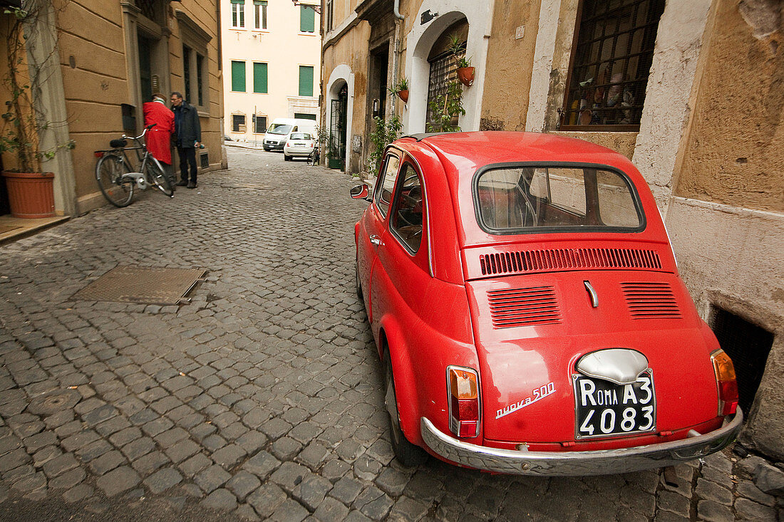Old red Fiat 500 car, Piazza Navona, Rome, Italy, Europe.