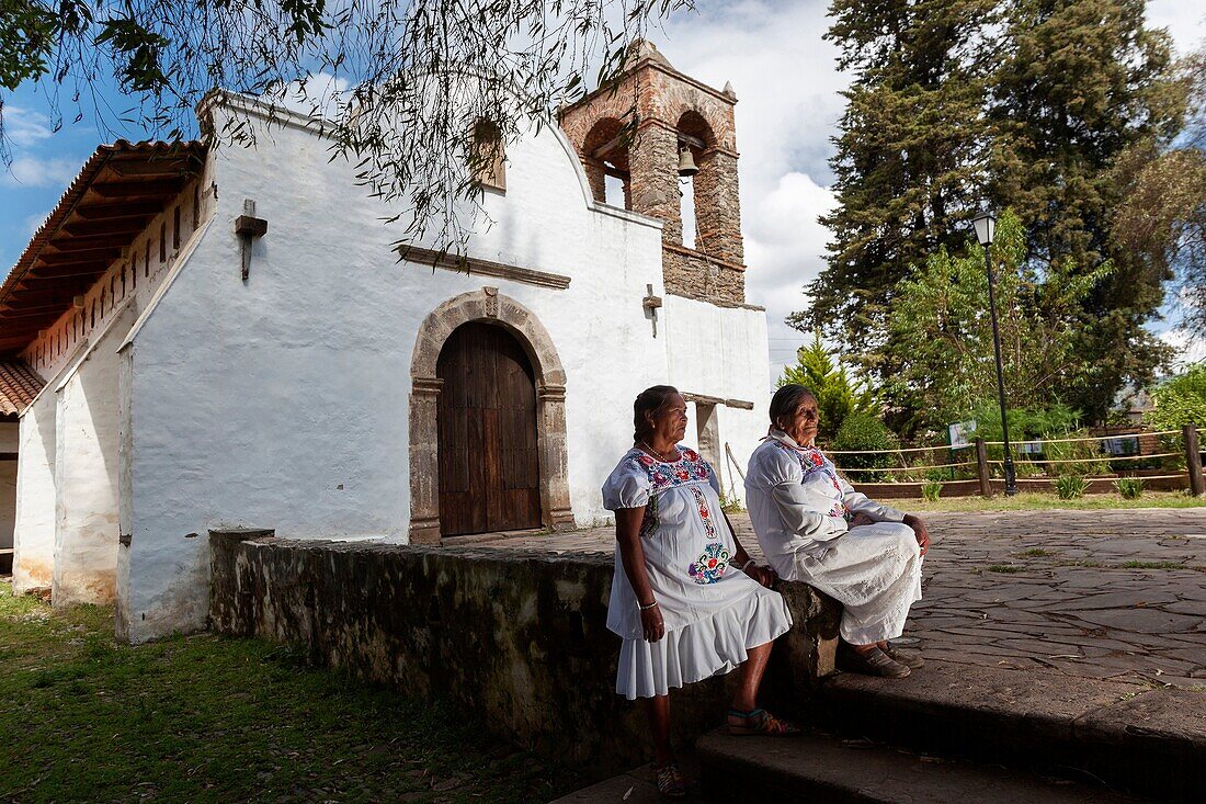 Two local women in Attaco church