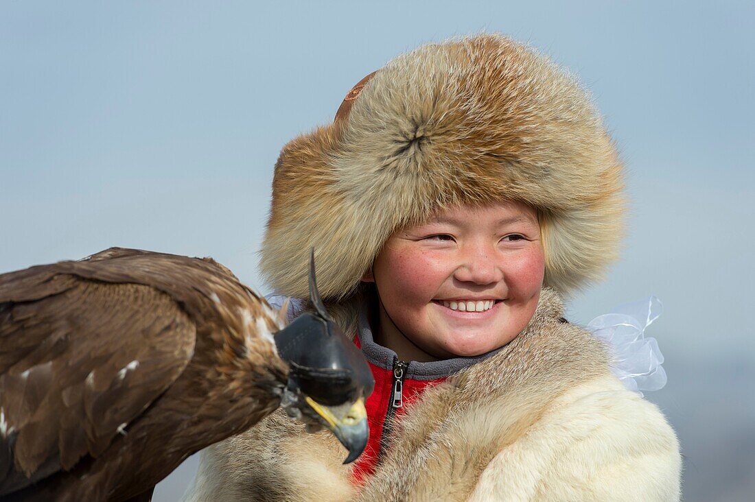 Portrait of a Kazakh teenage girl eagle hunter (winner of 2014 competition) at the Golden Eagle Festival on the festival grounds near the city of Ulgii (Ölgii) in the Bayan-Ulgii Province in western Mongolia.