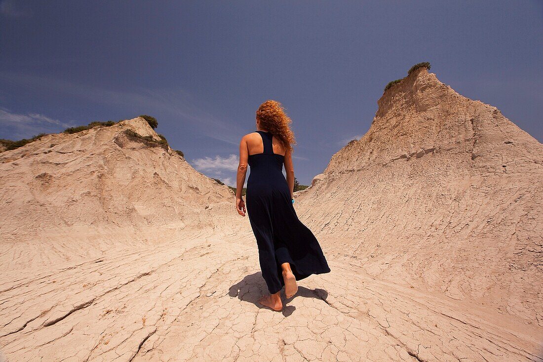 Woman at the geological formation near the village of Potamida, Chania Region, Crete, Greek Islands, Greece, Europe.