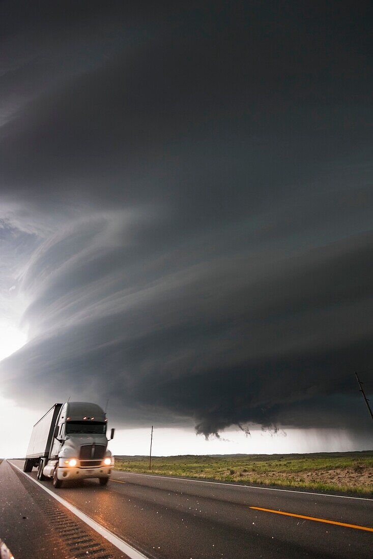 Very intense high precipitation supercell storm moves south in the Nebraska Sand Hills south of Valentine, July 13, 2009. Winds gusted upwards of 60 mph into this storm. Tornado warning with the storm mentioned baseball size hail and winds in excess of 10