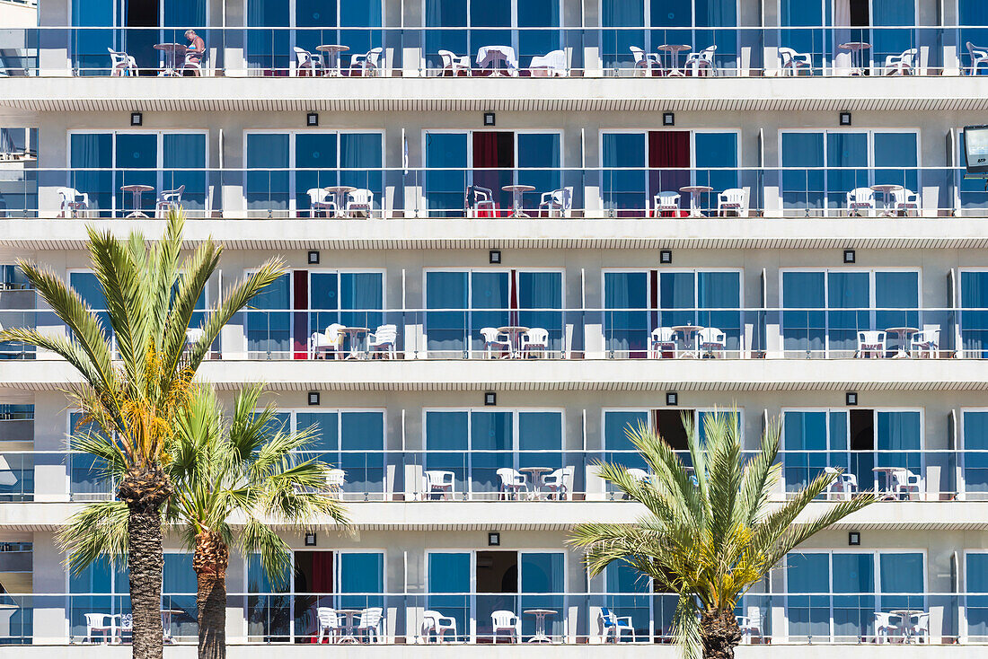 The typical front of a hotel complex with balconies in a seaside resort, Torremolinos, Andalusia, Spain