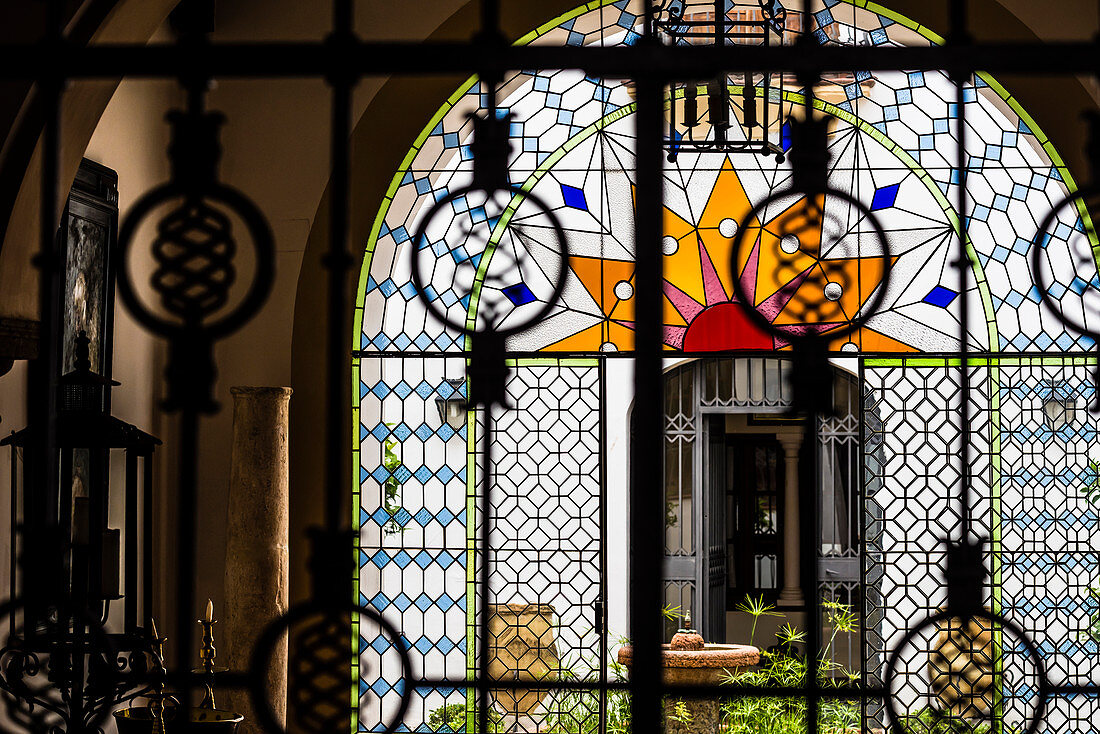 An inner courtyard of a typical old residential building in the historical centre, Cordoba, Andalusia, Spain