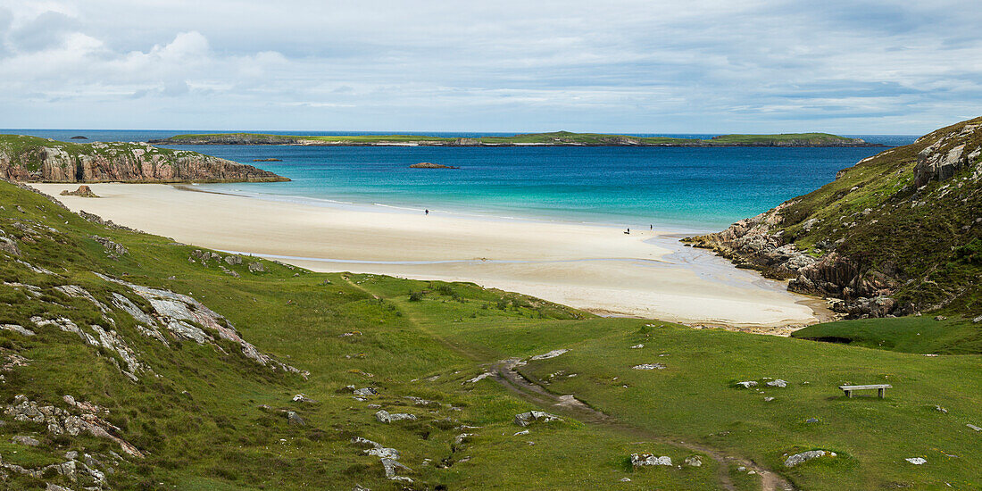 'A white sand beach and turquoise water along the coast of the Highlands; Scotland'