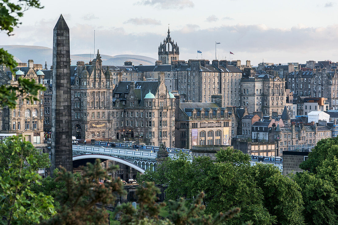 'New Town and pedestrians walking on a bridge; Edinburgh, Scotland'
