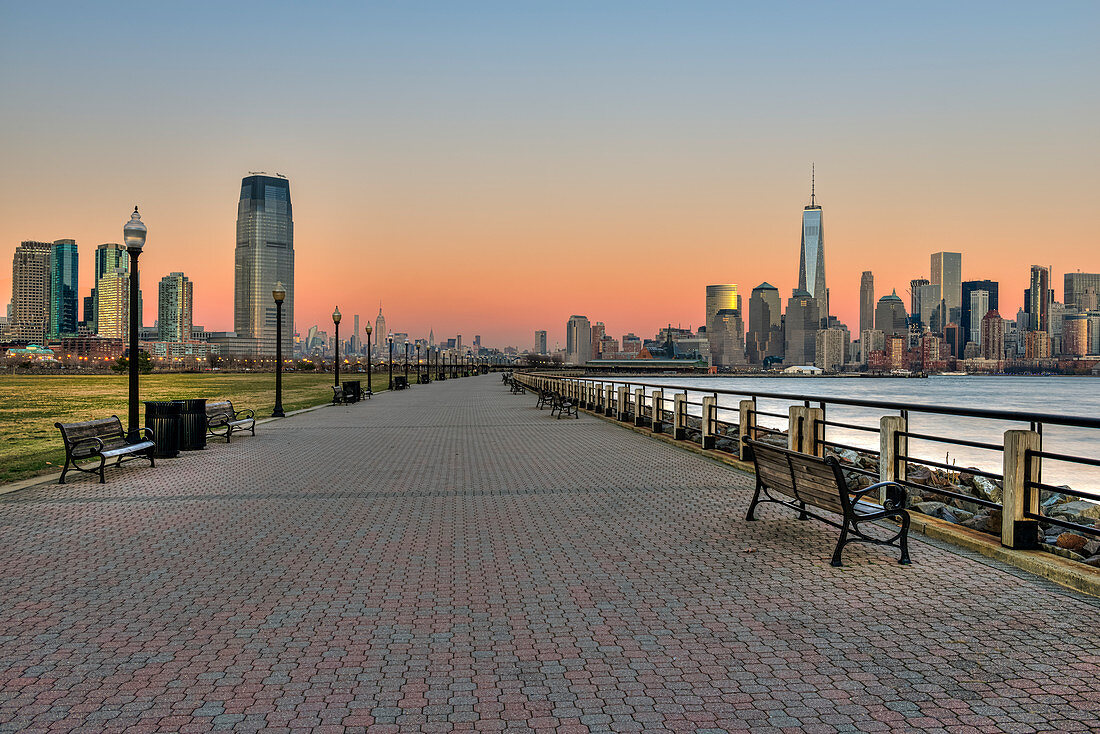 'Jersey City and Manhattan skylines at sunset, Liberty State Park; Jersey City, New Jersey, United States of America'