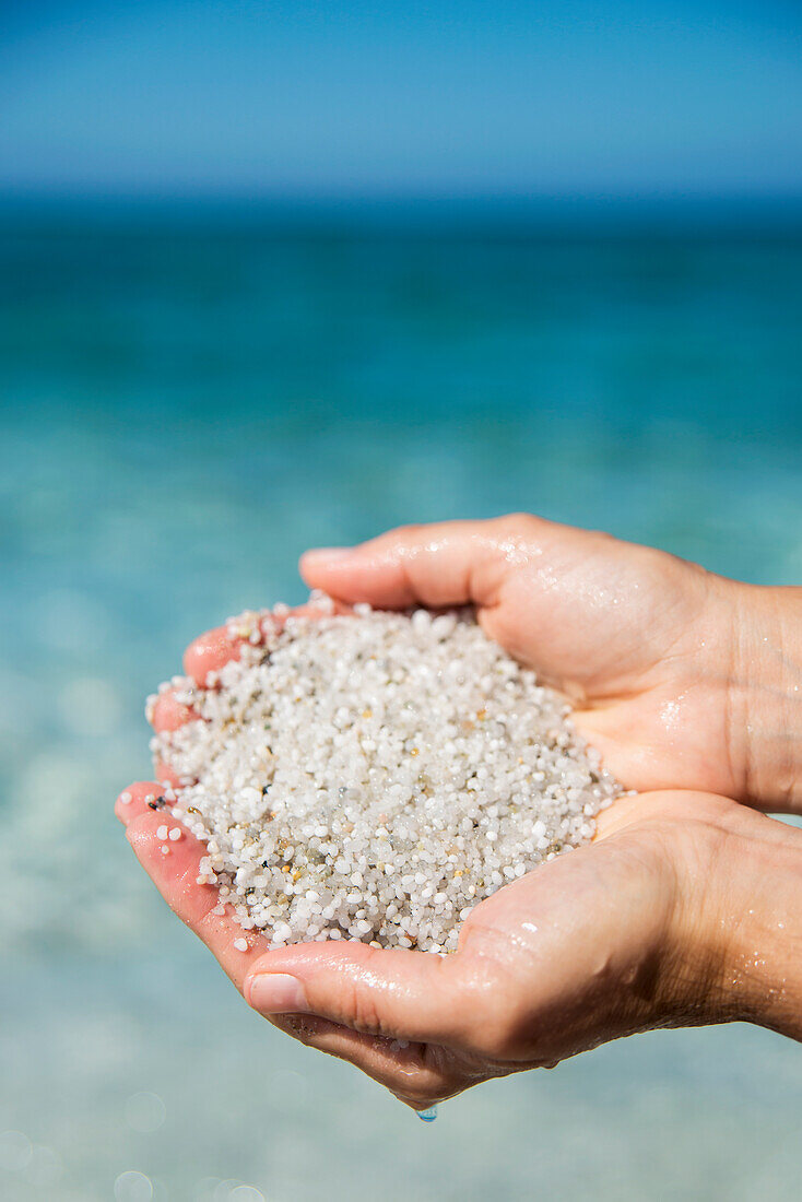 'Grains of quartz in Mari Ermi beach, also known as the beach of the grains of rice; Oristano, Sardinia, Italy'