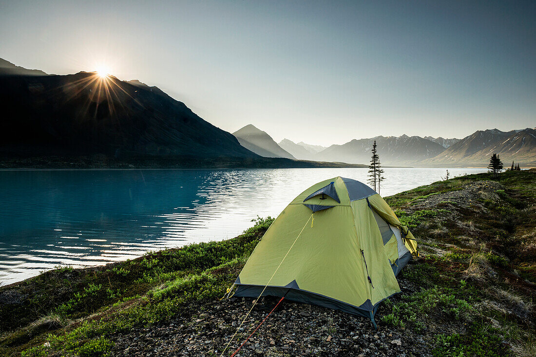 Scenic view of Lower Twin Lake with a backpacking tent in the foreground, Lake Clark National Park & Preserve, Southcentral Alaska