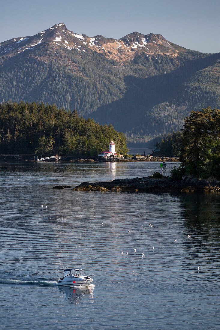 Scenic view of a lighthouse among the small islands in Sitka sound, Southeast Alaska, Summer