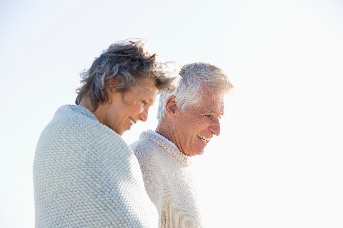 Close-up of an old couple smiling