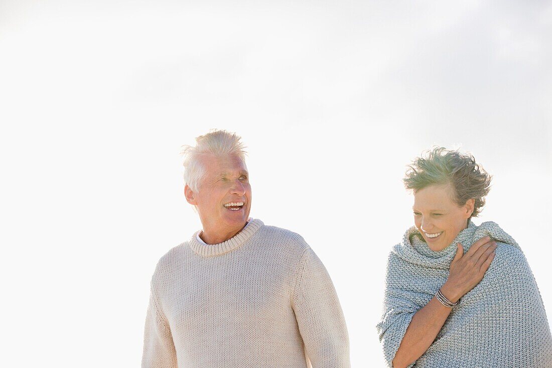 Close-up of an old couple smiling