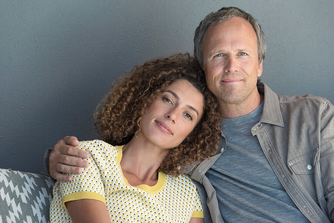 Portrait of a couple relaxing on a couch