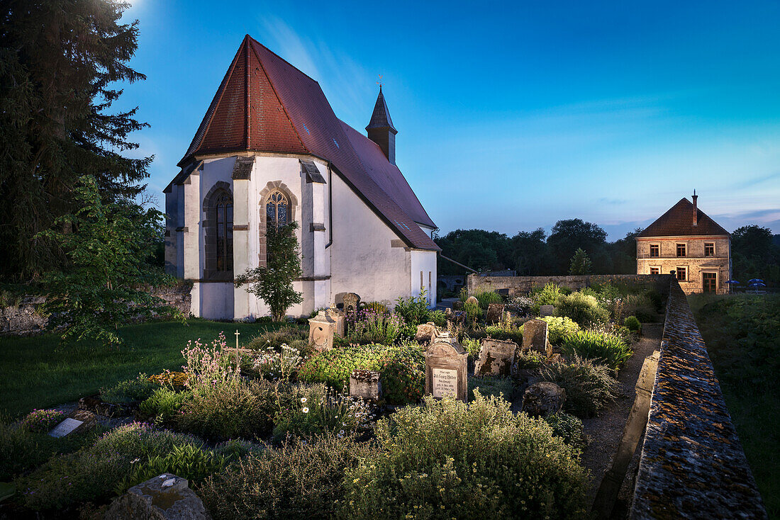 cemetery, school building and Stephanus church at deserted village Gruorn, former military area, Muensingen, Reutlingen district, Swabian Alb, Baden-Wuerttemberg, Germany, lightpainting