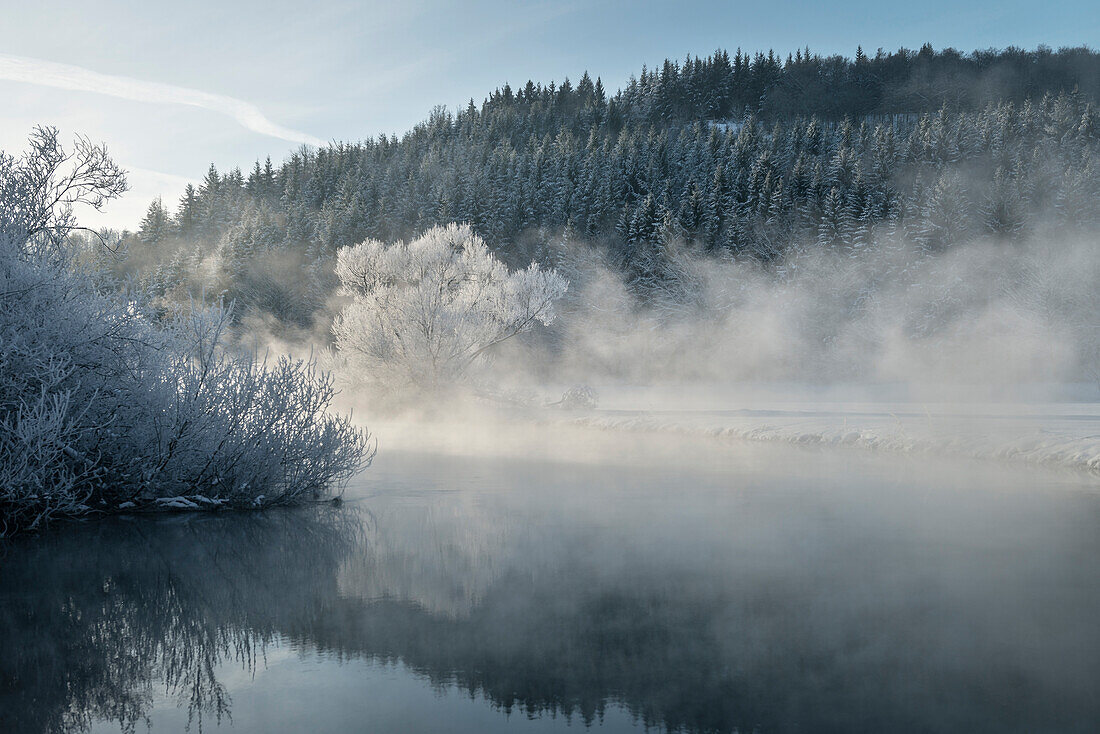 fog rises from River Blue, winter landscape at Blue River, Blue River Valley around Blaubeuren, Alb-Danube district, Swabian Alb, Baden-Wuerttemberg, Germany