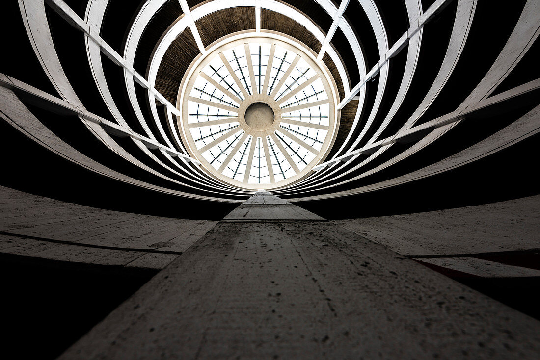 The graphically looking spiral driveway to a multi-storey car park from a low angle view, Hamburg, Germany