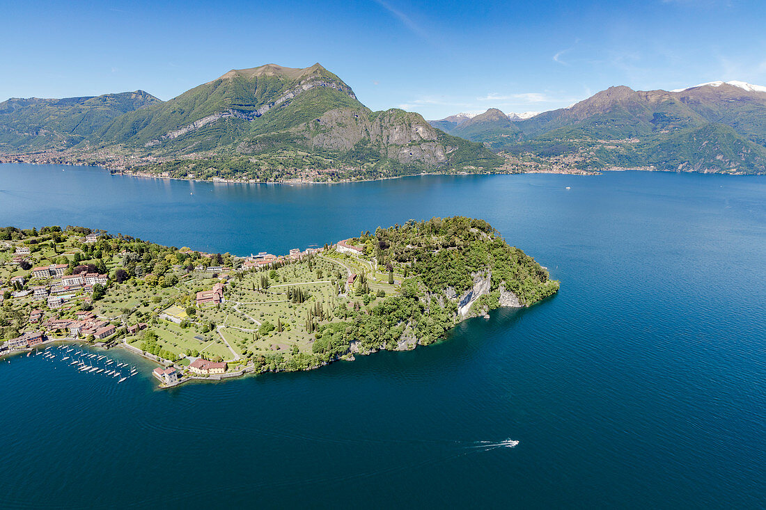 Aerial view of the village of Bellagio framed by clear waters of Lake Como with sailboats and gardens, Italian Lakes, Lombardy, Italy, Europe