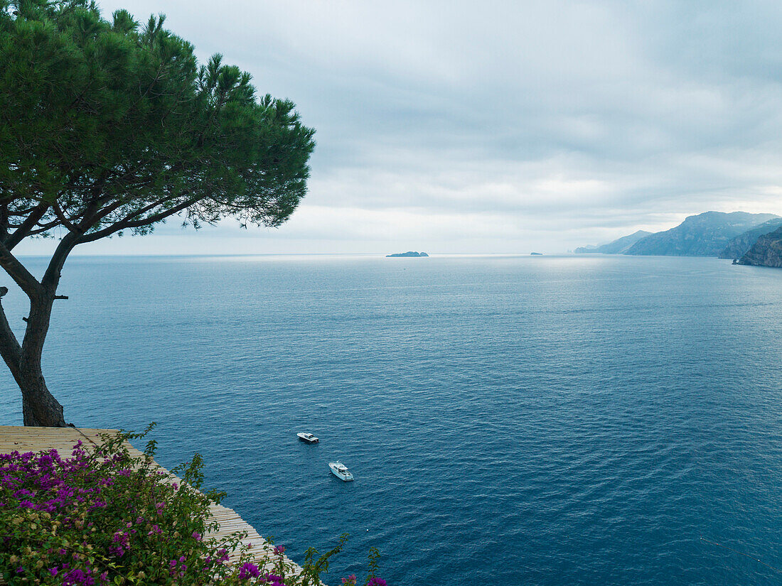 'Tranquil turquoise water of the Mediterranean along the Amalfi coast; Amalfi, Italy'
