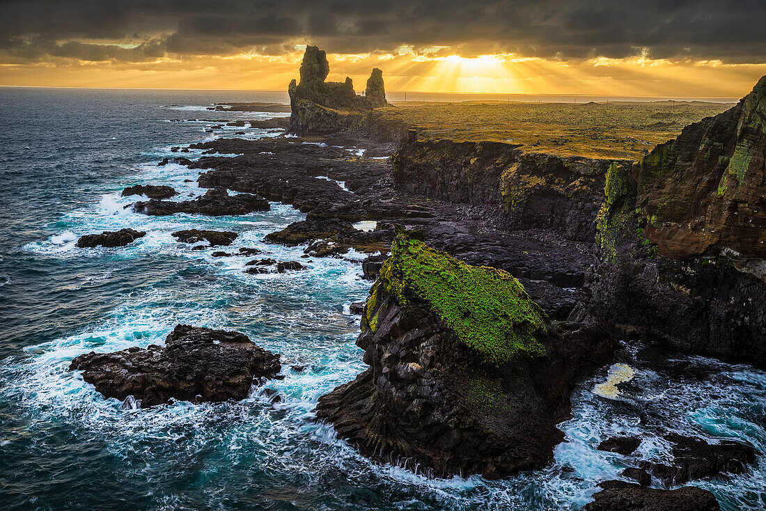 'The sea stack known as Londranger rises above the landscape, Snaefellsnes Peninsula; Iceland'