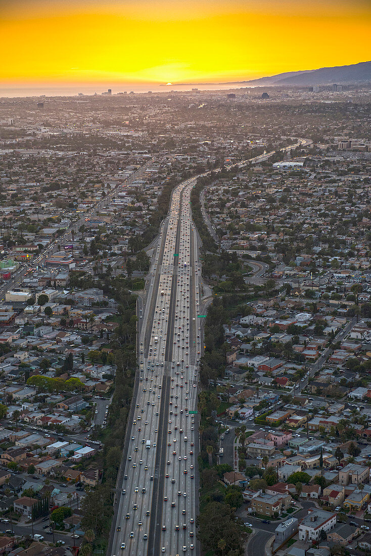 Aerial view of highway in suburban cityscape