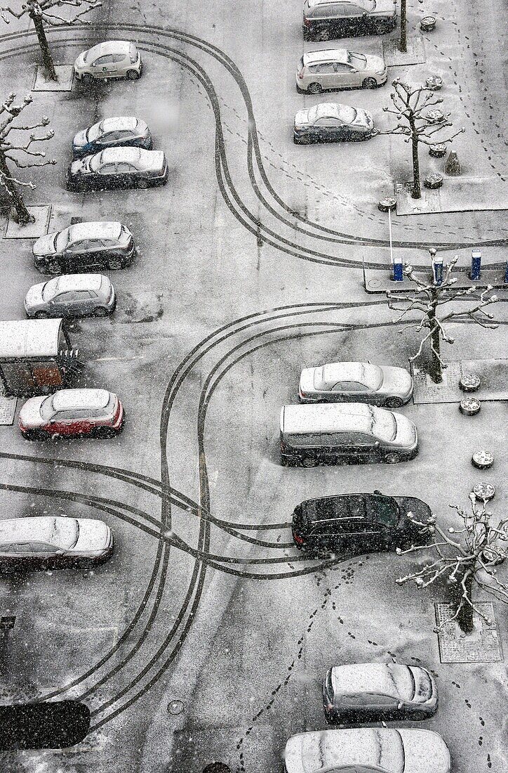 patterns created by cars in fresh snow in seen from above, Geneva, Switzerland, Europe