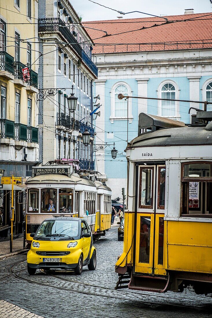 Traffic in Luis de Camoes square in Lisbon Portugal Europe.