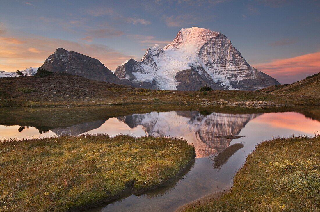 Sunrise over Mount Robson, highest mountain in the Canadian Rockies, elevation 3,954Â m (12,972Â ft), seen from Mumm Basin, Mount Robson Provincial Park British Columbia.