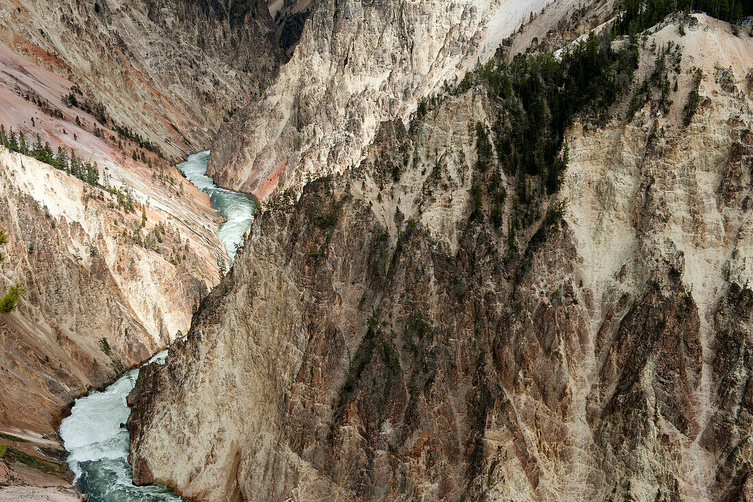 River running through canyon in Yellowstone National Park, Wyoming, USA