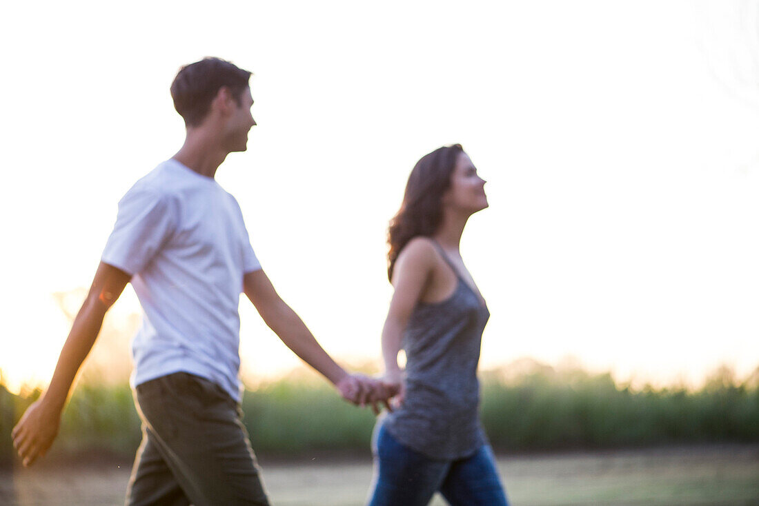 Couple taking walk together outdoors