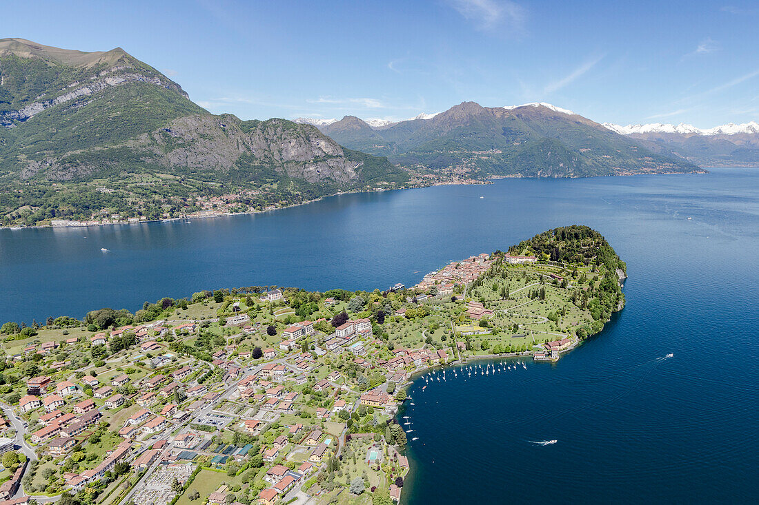 Aerial view of the village of Bellagio frames by the blue water of Lake Como on a sunny spring day Lombardy Italy Europe