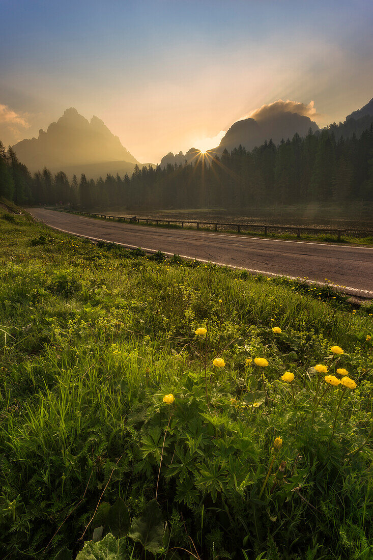 Tre Cime di Lavaredo/Drei Zinnen, Dolomites, South Tyrol, Italy. Sunrise on the Tre Cime di Lavaredo/Drei Zinnen with Lago Antorno Lake