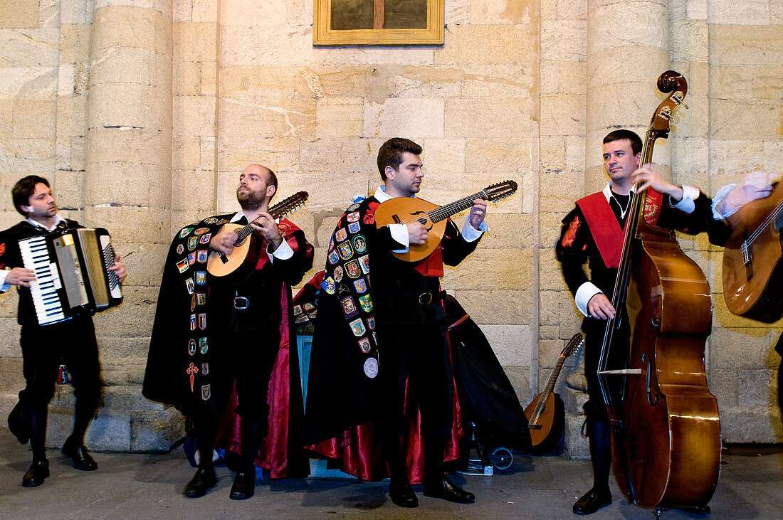 Spain, Galicia, Santiago de Compostela, listed as World Heritage by UNESCO, Los tunos, street singers and musicians with student outfit