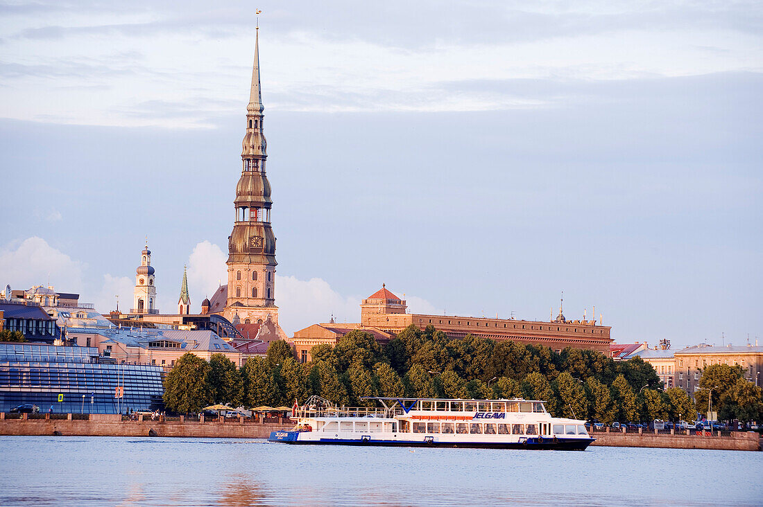 Latvia (Baltic States), Riga, European capital of culture 2014, historical centre listed as World Heritage by UNESCO, bell tower of St. John Church on Daugava River banks