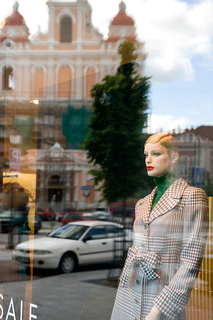Lithuania (Baltic States), Vilnius, historical center, listed as World Heritage by UNESCO, reflection into a store window