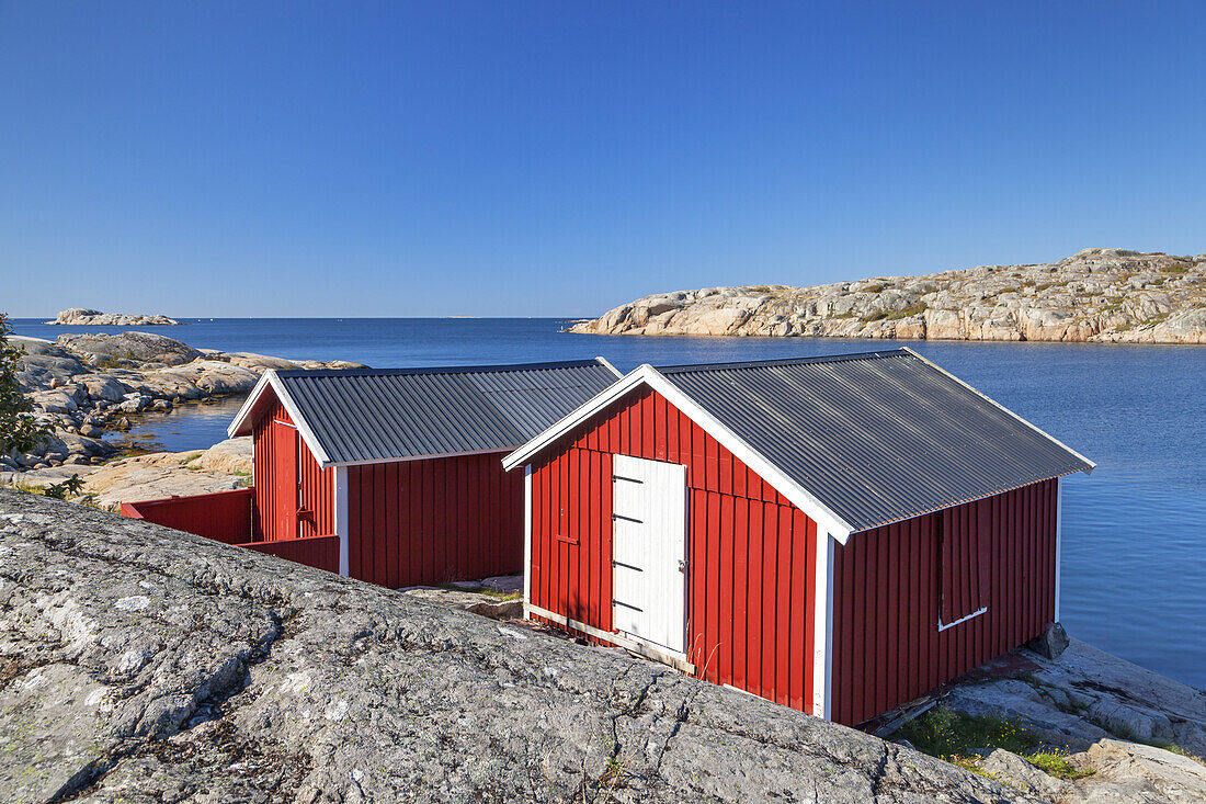 Red huts by the sea on the isle Fotoe, Bohuslaen, Vaestra Goetaland County, Archipelago of Gothenburg, Scandinavia, South Sweden, Sweden,  Northern Europe