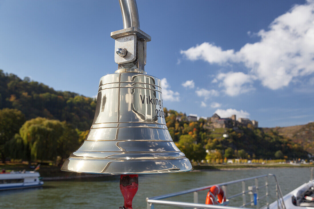 Ship bell of the Cruise ship Viking Sun on the Rhine underneath Rheinfels castle, St. Goar, Upper Middle Rhine Valley, Rheinland-Palatinate, Germany, Europe