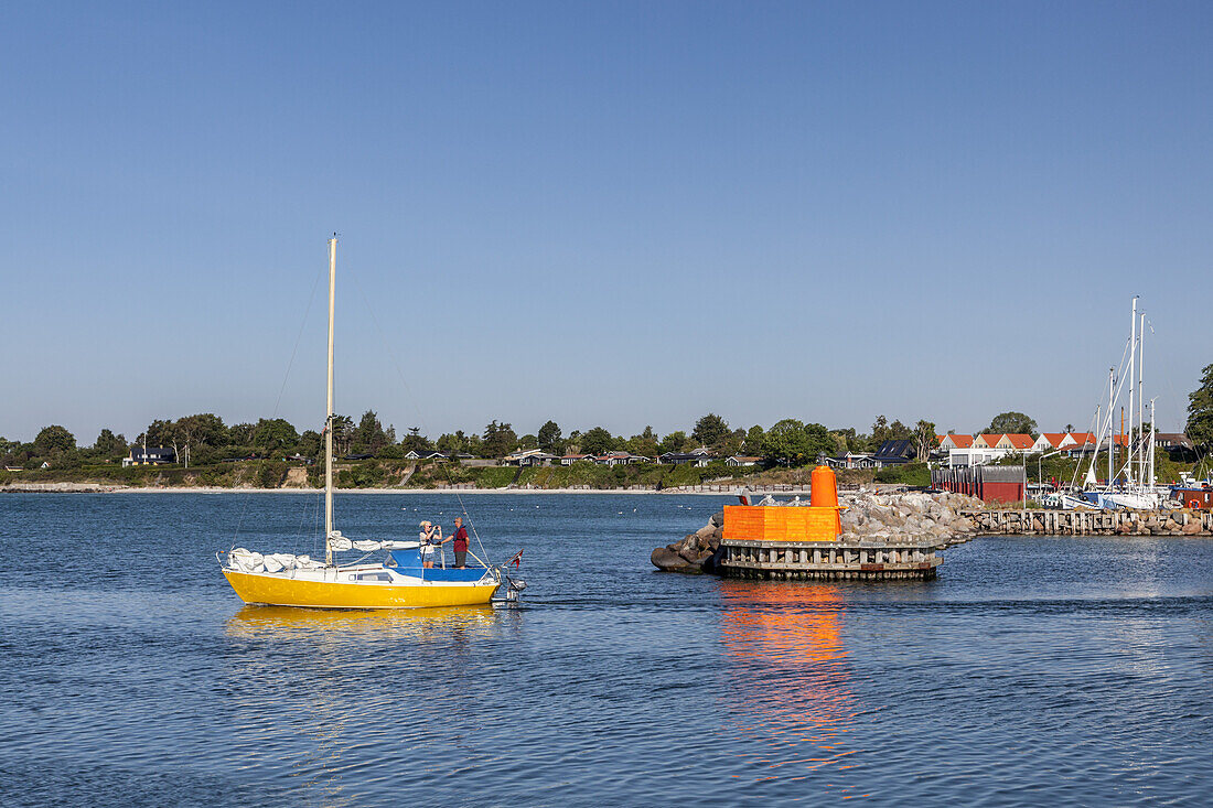 Sailboat in front of the harbour of Rødvig, Stevns Peninsula, Island of Zealand, Scandinavia, Denmark, Northern Europe