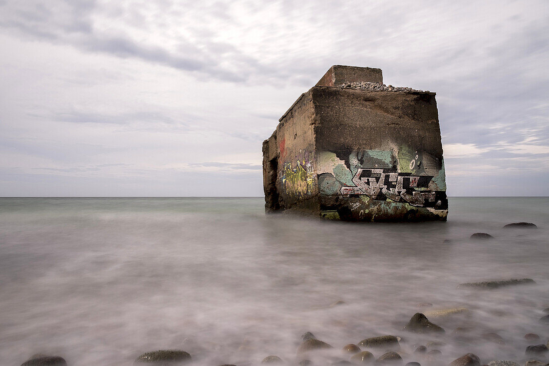 A concrete part of an old bunker of the DDR in the Baltic Sea at the Hohen Ufer on the Darß. Hohes Ufer, Ahrenshoop, the Darß, Mecklenburg-Vorpommern, Germany