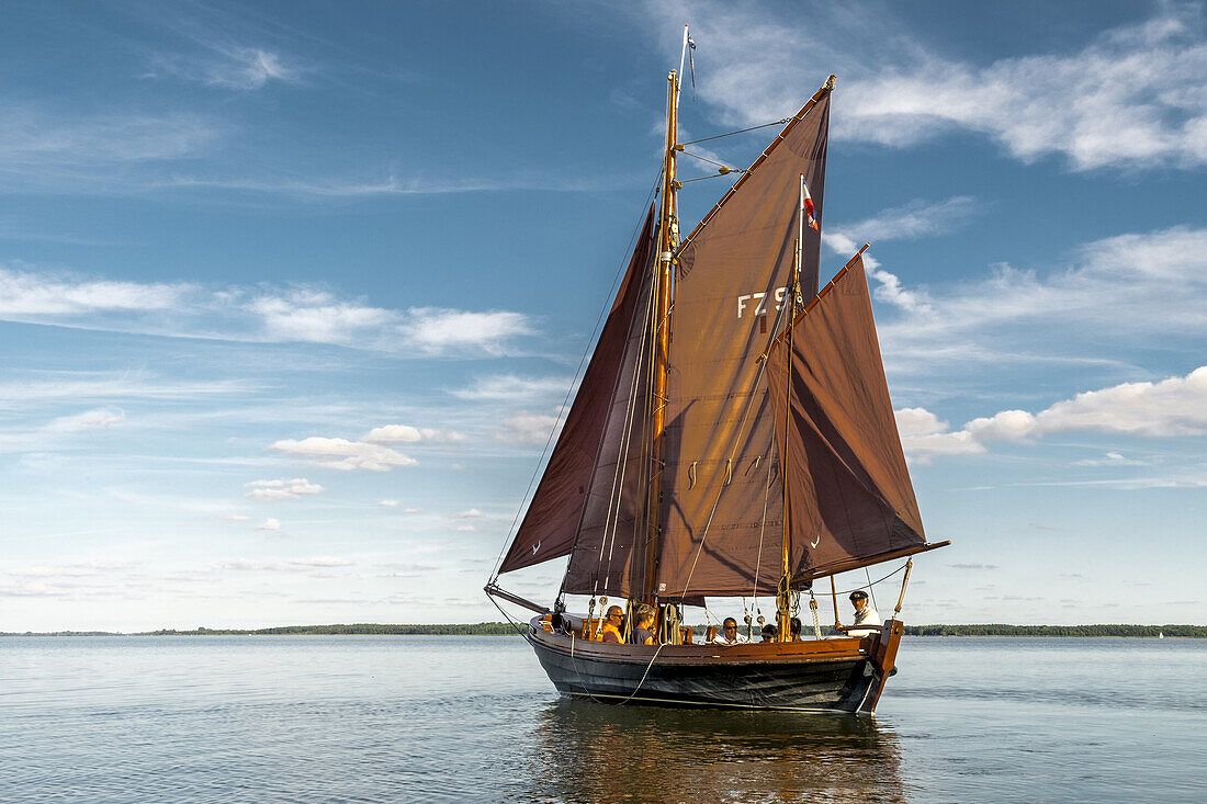 A Zeesenboot, or Zeesboot sails on the Bodden in Dierhagen. Dierhagen, Darß, Mecklenburg-Vorpommern, Germany